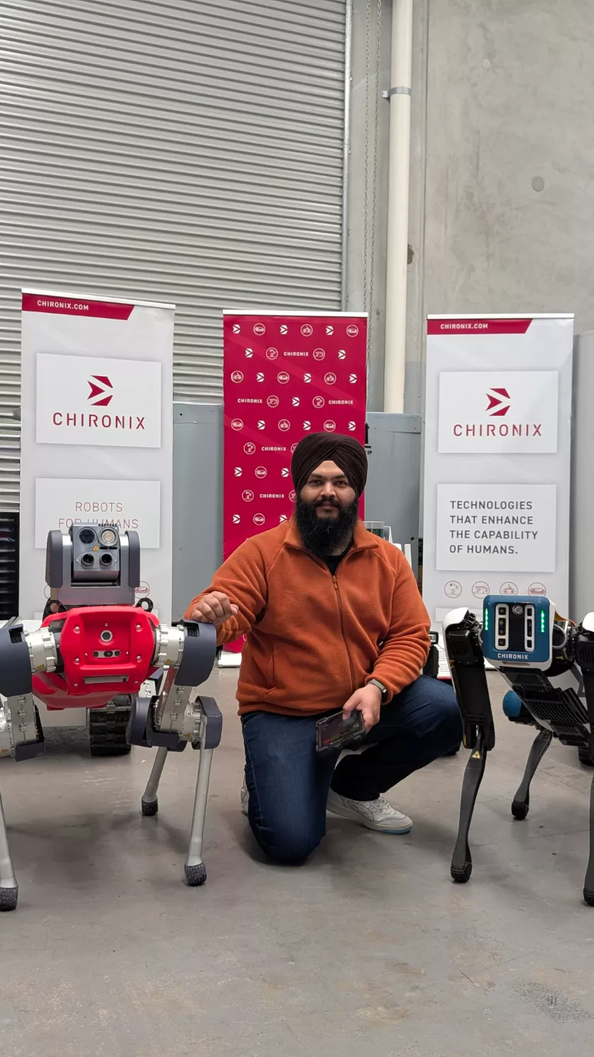 Aksh Randhawa with quadruped robots