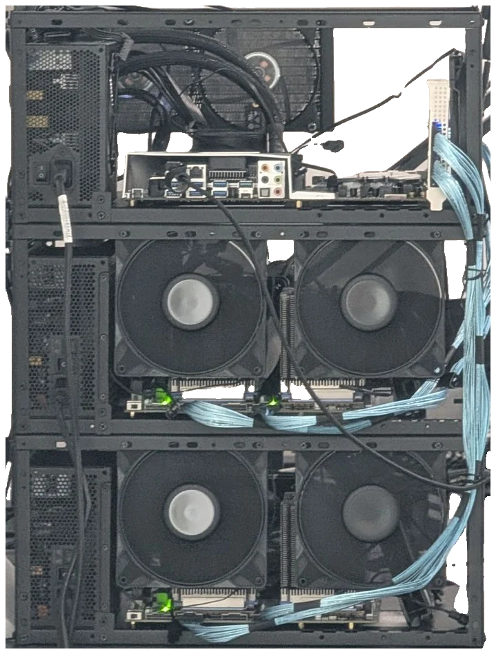 The finished three-tier rig from the front, with blue SFF-8654 cables and large fans on each tier